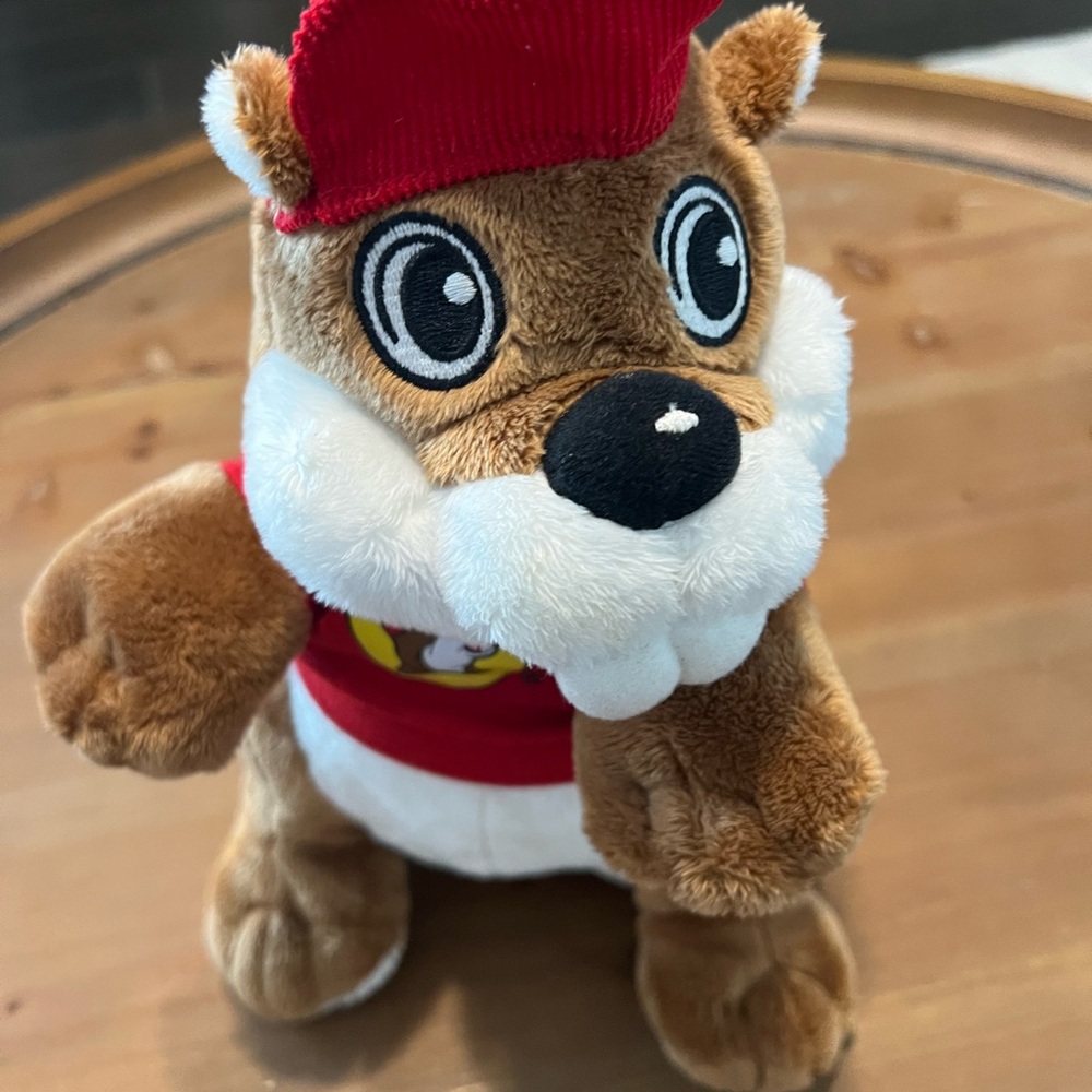 Brown and Red Plush Toy